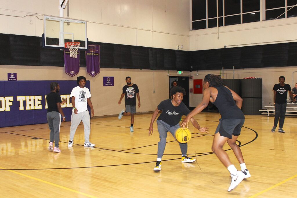 Young players participate in Vallejo's Late Night Basketball program on Friday.